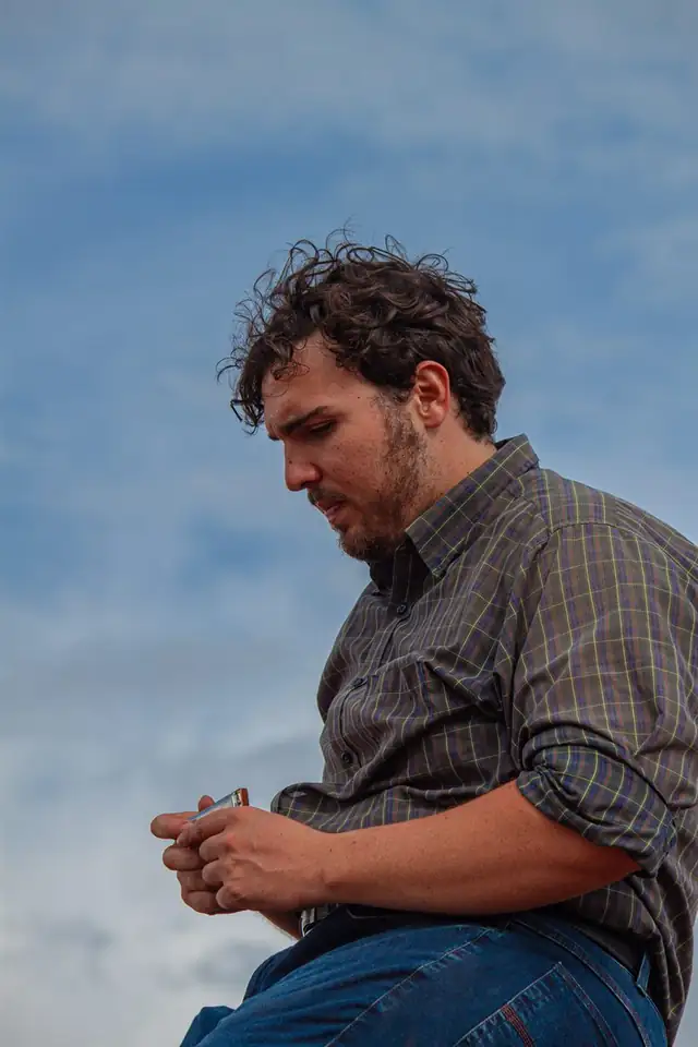 Guilherme tocando gaita
